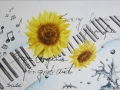 Sonnenblumen mit Noten und Klavier